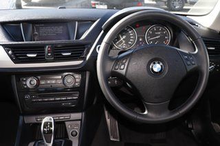 2013 BMW X1 E84 LCI sDrive20i Steptronic Black 8 Speed Sports Automatic Wagon