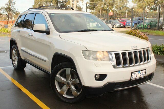 Used Jeep Grand Cherokee WK MY12 Limited (4x4) West Footscray, 2012 Jeep Grand Cherokee WK MY12 Limited (4x4) White 5 Speed Automatic Wagon
