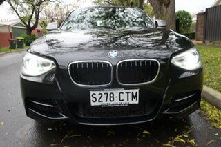 2015 BMW 1 Series F20 MY0714 M135i Black 8 Speed Sports Automatic Hatchback.