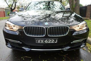 2012 BMW 320i F30 Luxury Line Black 8 Speed Automatic Sedan.