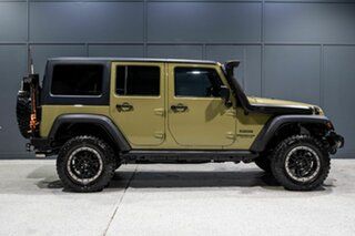2013 Jeep Wrangler Unlimited JK MY13 Sport (4x4) Green 5 Speed Automatic Softtop