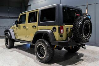2013 Jeep Wrangler Unlimited JK MY13 Sport (4x4) Green 5 Speed Automatic Softtop.