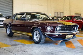 1969 Ford Mustang GRANDE Maroon Coupe.