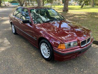 1994 BMW 318i Red 4 Speed Automatic Sedan.