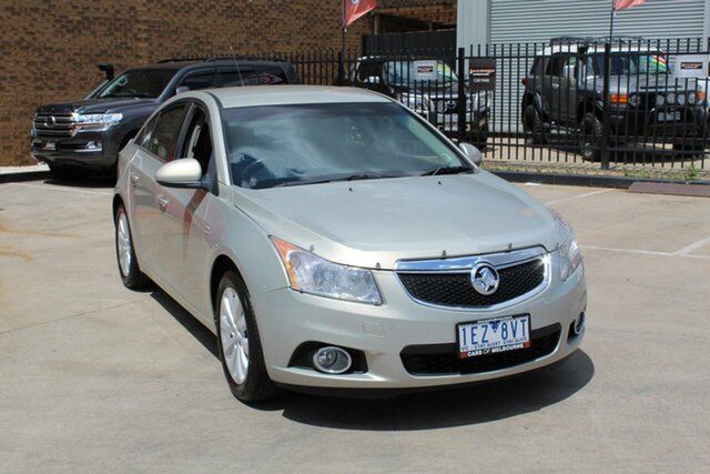 Used Holden Cruze JH CDX Hoppers Crossing, 2011 Holden Cruze JH CDX Gold 5 Speed Manual Sedan