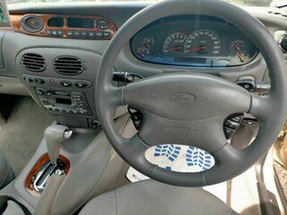 1999 Ford Fairmont AU Ghia Bronze 4 Speed Automatic Sedan