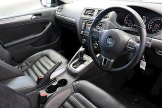 2013 Volkswagen Jetta 1B MY13.5 147TSI DSG Highline Black 6 Speed Sports Automatic Dual Clutch Sedan