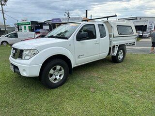 2009 Nissan Navara D40 RX King Cab White 5 Speed Automatic Cab Chassis.