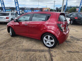 2012 Holden Barina TM MY13 CDX Red 6 Speed Automatic Hatchback.