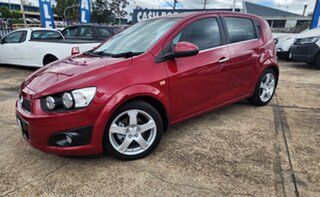 2012 Holden Barina TM MY13 CDX Red 6 Speed Automatic Hatchback.