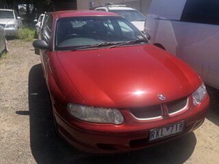 2001 Holden Commodore VX Executive Red 4 Speed Automatic Sedan.