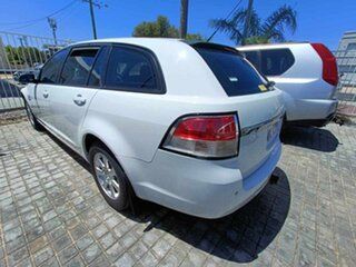 2008 Holden Commodore VE MY08 Omega White 4 Speed Automatic Sedan.