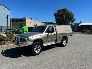 2003 Toyota Hilux VZN167R MY02 Gold 5 Speed Manual Cab Chassis.