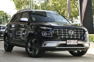 2023 Hyundai Venue QX.V5 MY23 Elite Abyss Black + Chalk White Ttr 6 Speed Automatic Wagon.