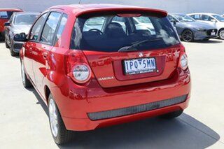 2011 Holden Barina TK MY11 Red 4 Speed Automatic Hatchback