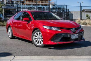 2019 Toyota Camry Hybrid Feverish Red Sedan.