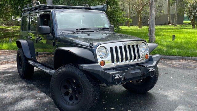 Used Jeep Wrangler Unlimited JK MY09 Sport (4x4) Underwood, 2010 Jeep Wrangler Unlimited JK MY09 Sport (4x4) Black 6 Speed Manual Softtop
