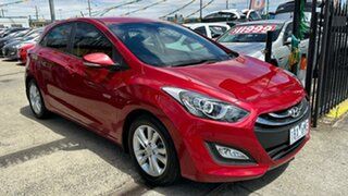 2014 Hyundai i30 GD2 MY14 Trophy Red 6 Speed Sports Automatic Hatchback.