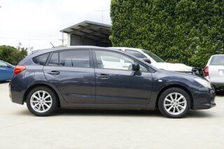 2014 Subaru Impreza G4 MY14 X AWD Black 6 Speed Manual Hatchback.