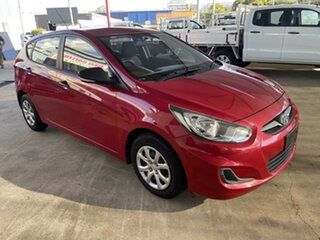 2013 Hyundai Accent RB Active Red 5 Speed Manual Hatchback.
