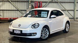 2012 Volkswagen Beetle 1L MY13 Coupe DSG White 7 Speed Sports Automatic Dual Clutch Liftback.