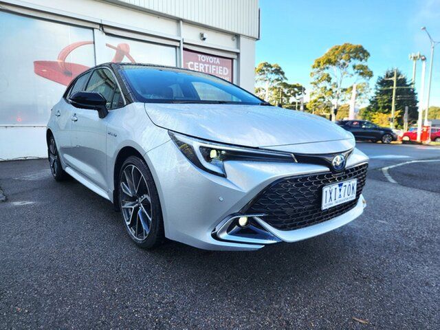 Pre-Owned Toyota Corolla ZWE211R ZR E-CVT Hybrid Ferntree Gully, 2022 Toyota Corolla ZWE211R ZR E-CVT Hybrid Silver Pearl - Black Roof 10 Speed Constant Variable