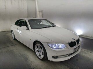 2011 BMW 3 Series E93 MY11 320d Steptronic White 6 Speed Sports Automatic Convertible.