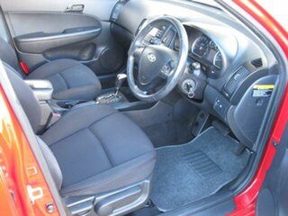 2010 Hyundai i30 FD MY11 Trophy Red 4 Speed Automatic Hatchback.