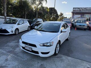 2010 Mitsubishi Lancer CJ MY11 SX White 5 Speed Manual Sedan.