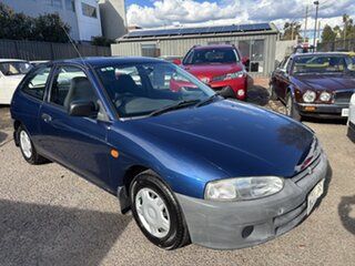 2003 Mitsubishi Mirage CE Blue 4 Speed Automatic Hatchback.