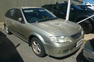 2003 Mazda 323 BJ II-J48 Astina Gold 5 Speed Manual Hatchback.