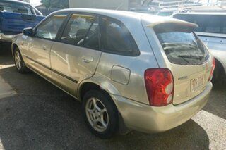 2003 Mazda 323 BJ II-J48 Astina Gold 5 Speed Manual Hatchback.