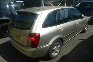 2003 Mazda 323 BJ II-J48 Astina Gold 5 Speed Manual Hatchback.
