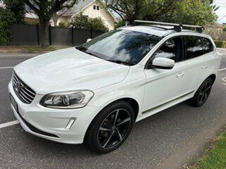 2015 Volvo XC60 DZ MY15 D4 Geartronic Luxury White 8 Speed Sports Automatic Wagon.