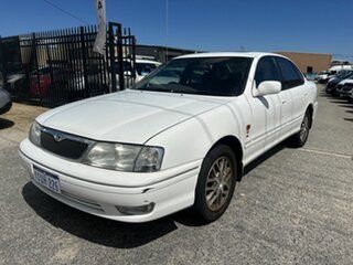 2002 Toyota Avalon MCX10R Grande White 4 Speed Automatic Sedan.