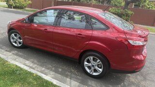 2014 Ford Focus LW MK2 MY14 Trend Red Passion 6 Speed Automatic Sedan