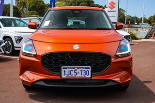 2025 Suzuki Swift UZ Hybrid Flame Orange 5 Speed Manual Hatchback.