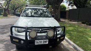 2011 Mitsubishi Triton MN MY11 GLX (4x4) White Crystal 4 Speed Automatic 4x4 Double Cab Utility.