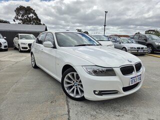 2011 BMW 3 Series E90 MY11 320i Steptronic Lifestyle White 6 Speed Sports Automatic Sedan.