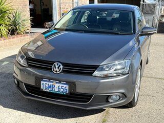 2014 Volkswagen Jetta 1B MY14 118TSI DSG Comfortline Grey 7 Speed Sports Automatic Dual Clutch Sedan.