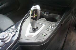 2014 BMW 1 Series F20 MY0713 118i Steptronic Black 8 Speed Sports Automatic Hatchback