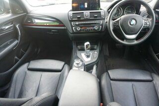2014 BMW 1 Series F20 MY0713 118i Steptronic Black 8 Speed Sports Automatic Hatchback