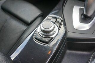 2014 BMW 1 Series F20 MY0713 118i Steptronic Black 8 Speed Sports Automatic Hatchback