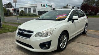 2014 Subaru Impreza MY14 2.0I-L (AWD) White 6 Speed Manual Hatchback.