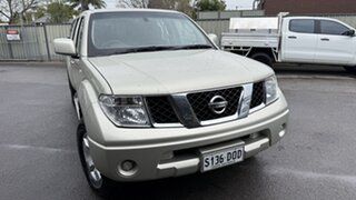2010 Nissan Navara D40 ST (4x4) Champagne 5 Speed Automatic Dual Cab Pick-up