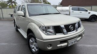 2010 Nissan Navara D40 ST (4x4) Champagne 5 Speed Automatic Dual Cab Pick-up.
